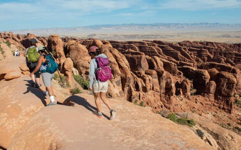 One of the best ways to experience the beauty of Arches National Park is on foot.