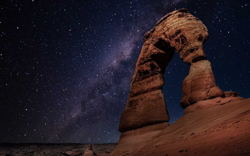 With its remote location and minimal light pollution, Arches National Park is an ideal spot for stargazing.