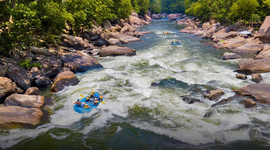 Further downstream from Thurmond, the river becomes narrower and includes technical Class III and IV rapids